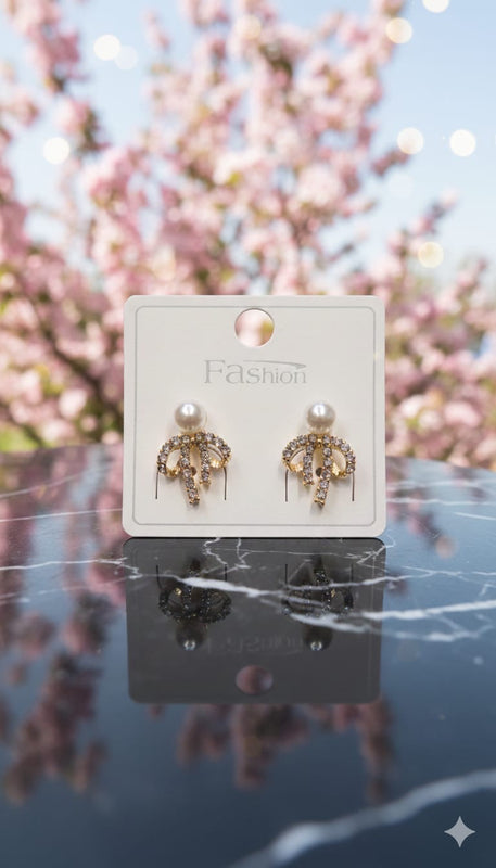 Sparkling Bow Design studded earrings