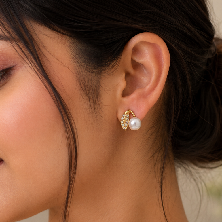 Sparkling crystal-studded leaf earrings