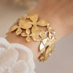 Golden Textured Flower Broad Bracelet